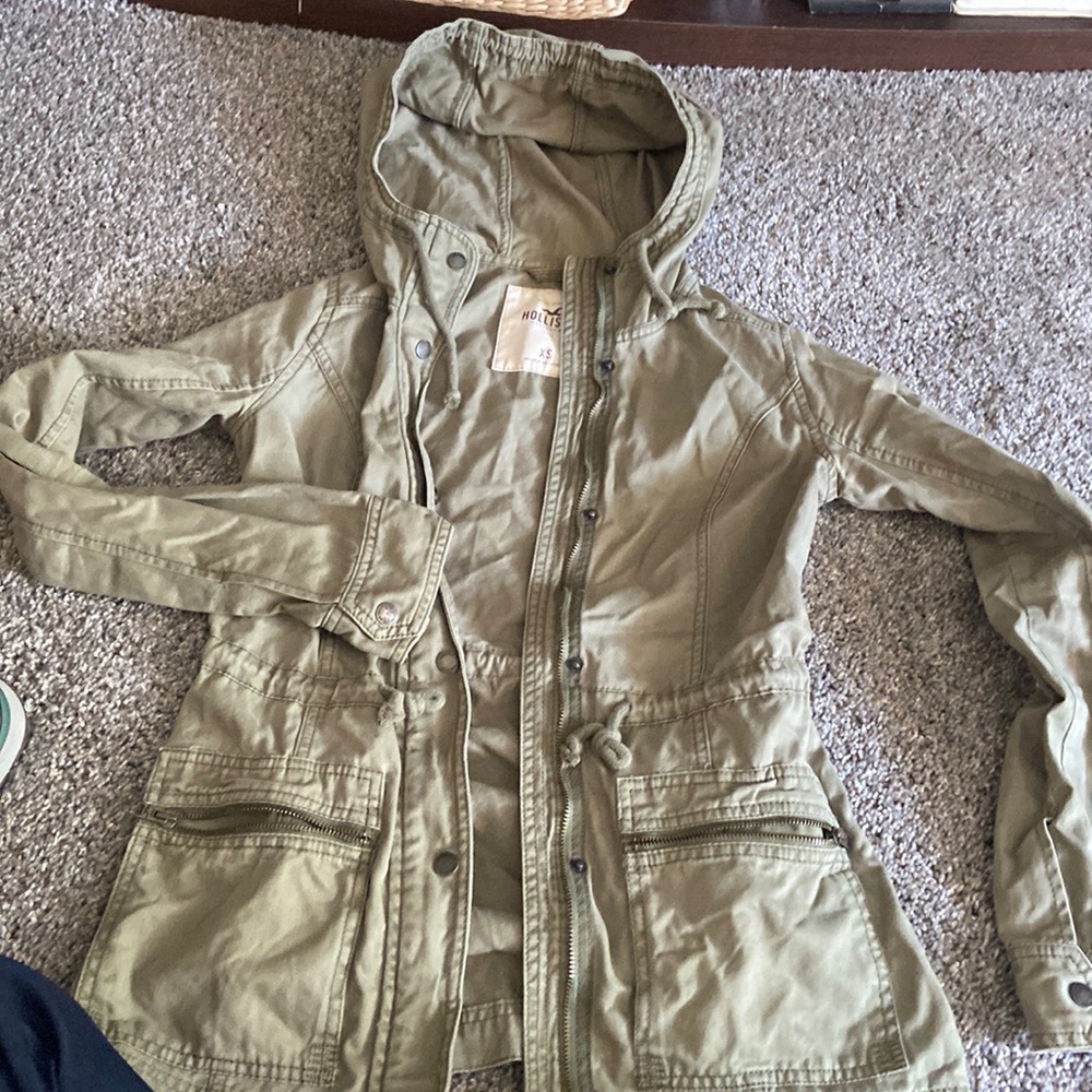 Faded light green in color. Still great condition